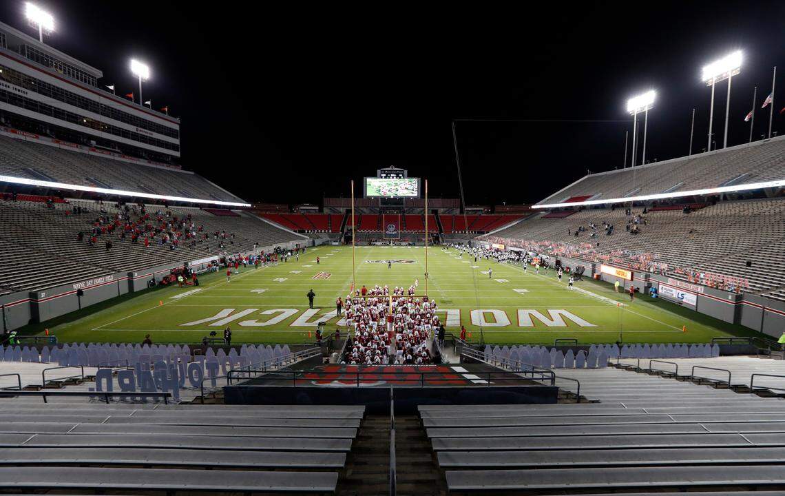 N.C. State takes the field before the Wolfpack’s game against Wake Forest at Carter-Finley Stadium in Raleigh, N.C, Saturday, Sept. 19, 2020.