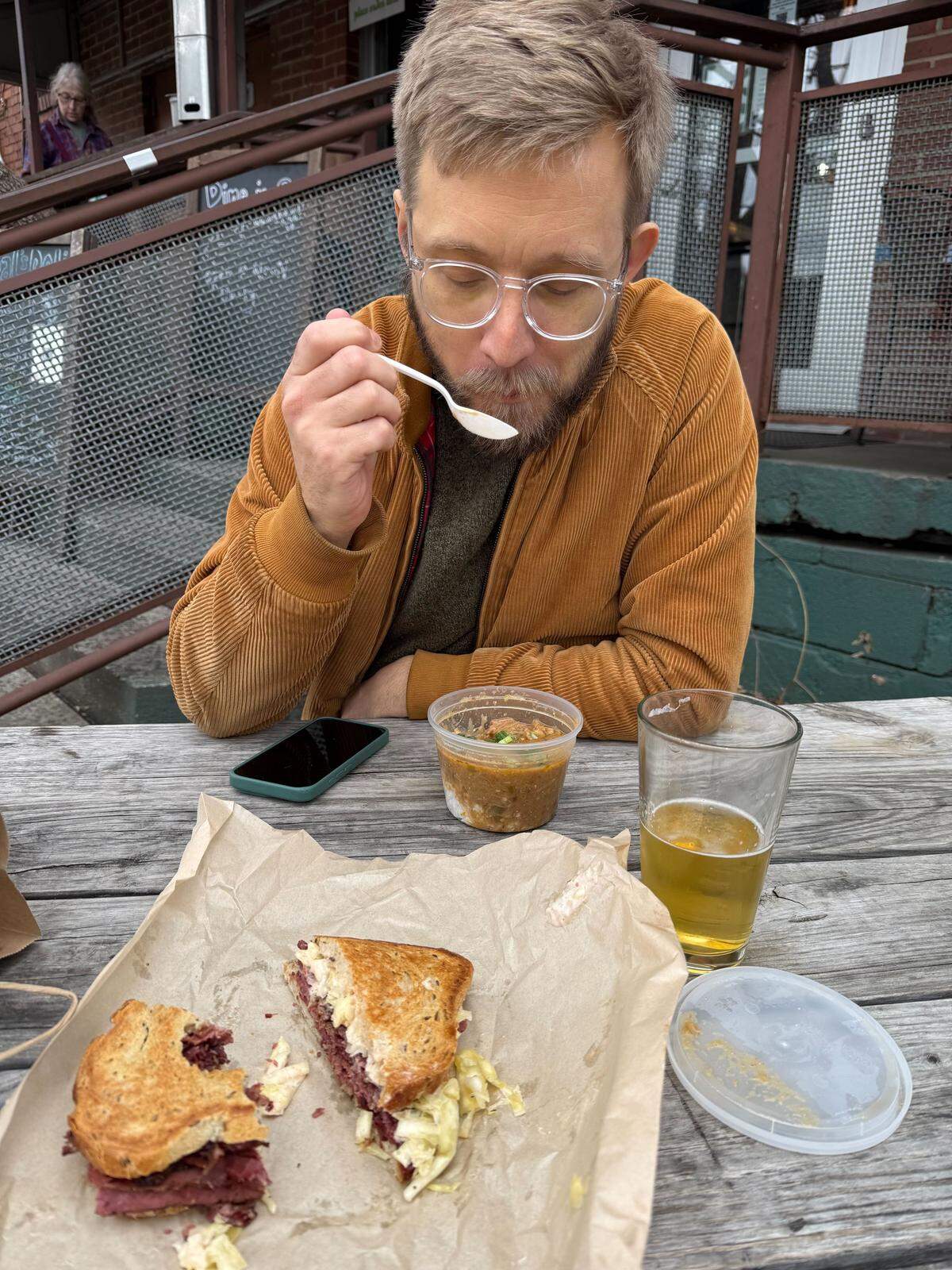 The N&O’s food & dining reporter Drew Jackson at Neal’s Deli in Carrboro for the Top 50 reporting project. Neal’s is an excellent example of a wonderful restaurant outside of the definitive “best of” list. (Photo by Kerry O’Connor, Drew’s wife.)