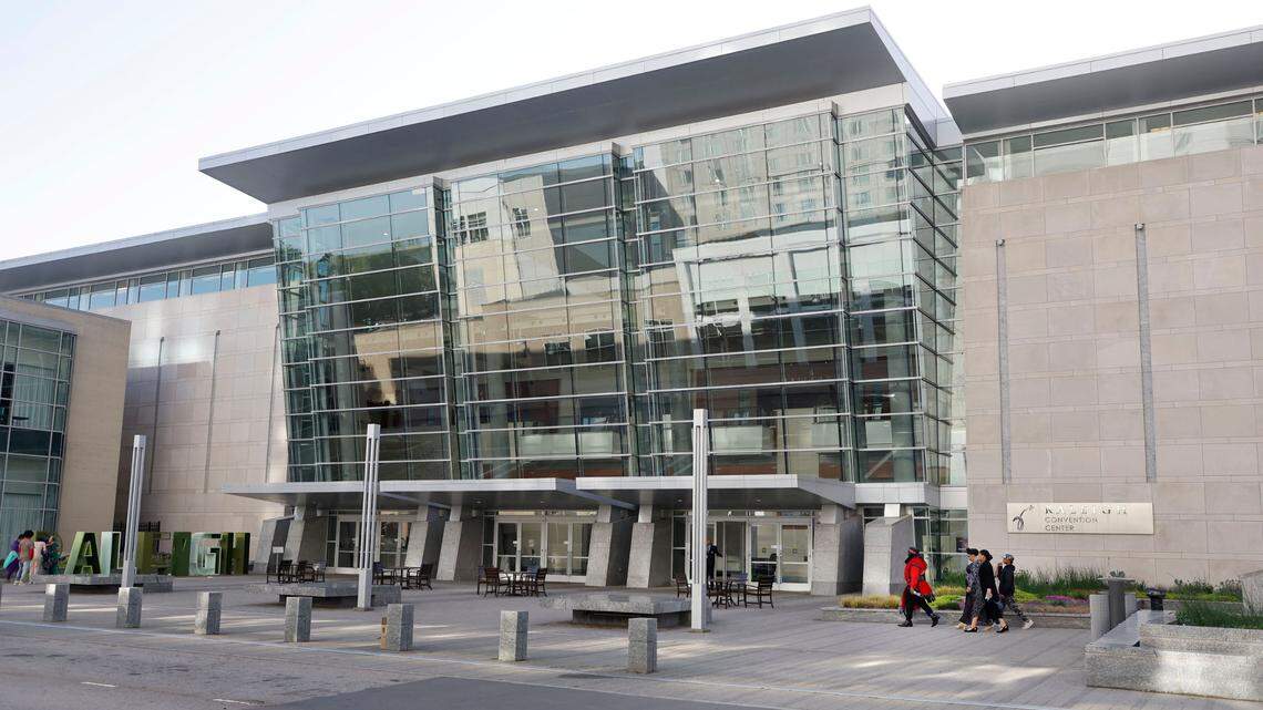 People enter the Raleigh Convention Center in Raleigh, N.C., Saturday evening, April 1, 2023.