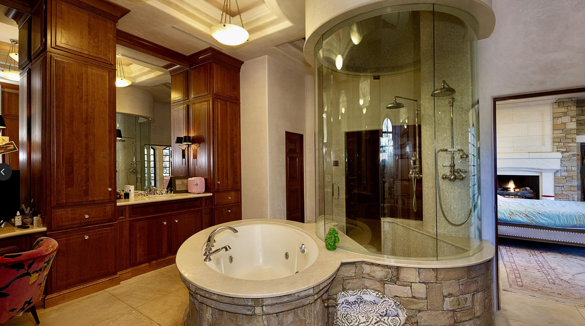 One of 14 bathrooms inside the luxury home in Raleigh that will be sold at auction in August.