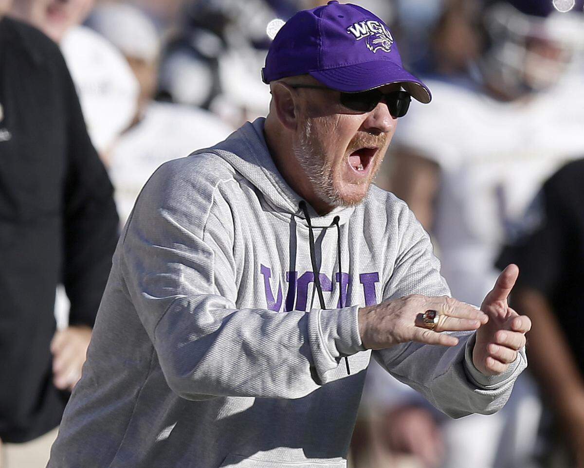 Western Carolina head coach Mark Speir reacts during the first half of an NCAA college football game against North Carolina in Chapel Hill, N.C., Saturday, Nov. 17, 2018. (AP Photo/Gerry Broome)