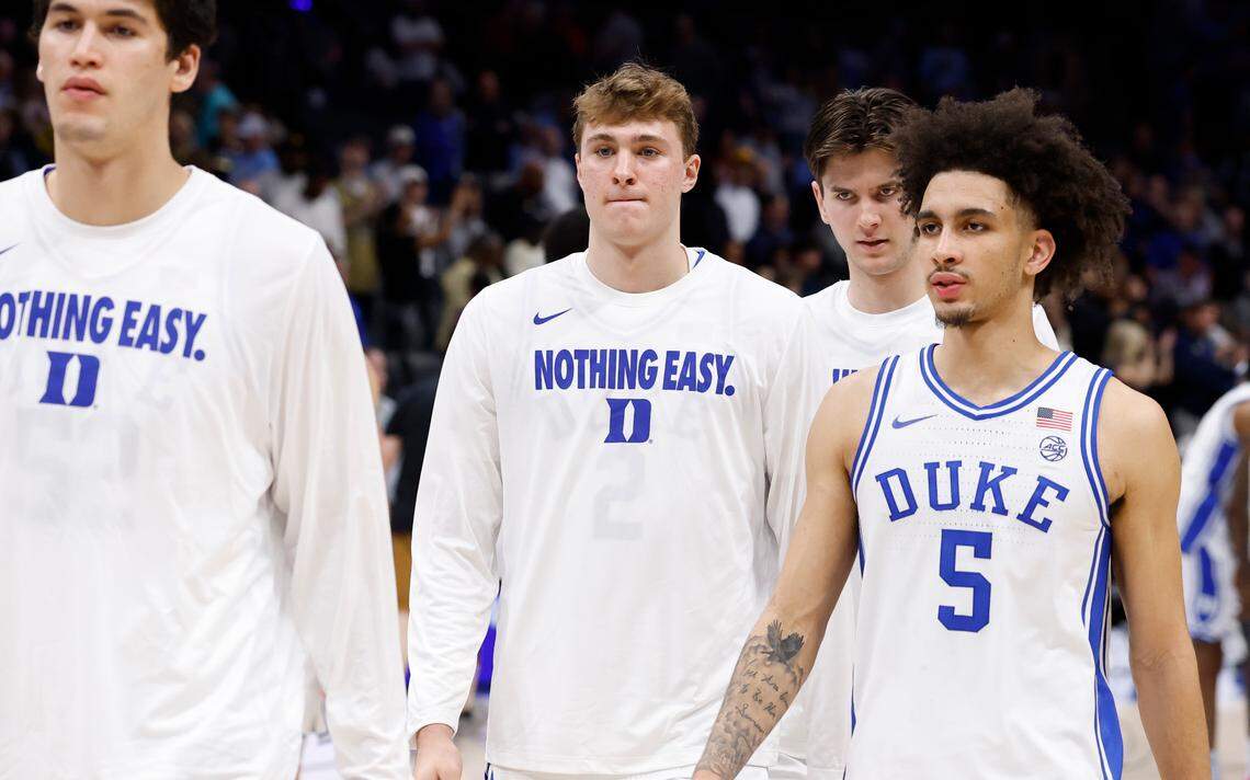 Duke’s Cooper Flagg walks off the floor with Tyrese Proctor (5) after Duke’s 78-70 victory over Georgia Tech in the quarterfinals of the 2025 ACC Men’s Basketball Tournament at the Spectrum Center in Charlotte, N.C., Thursday, March 13, 2025.