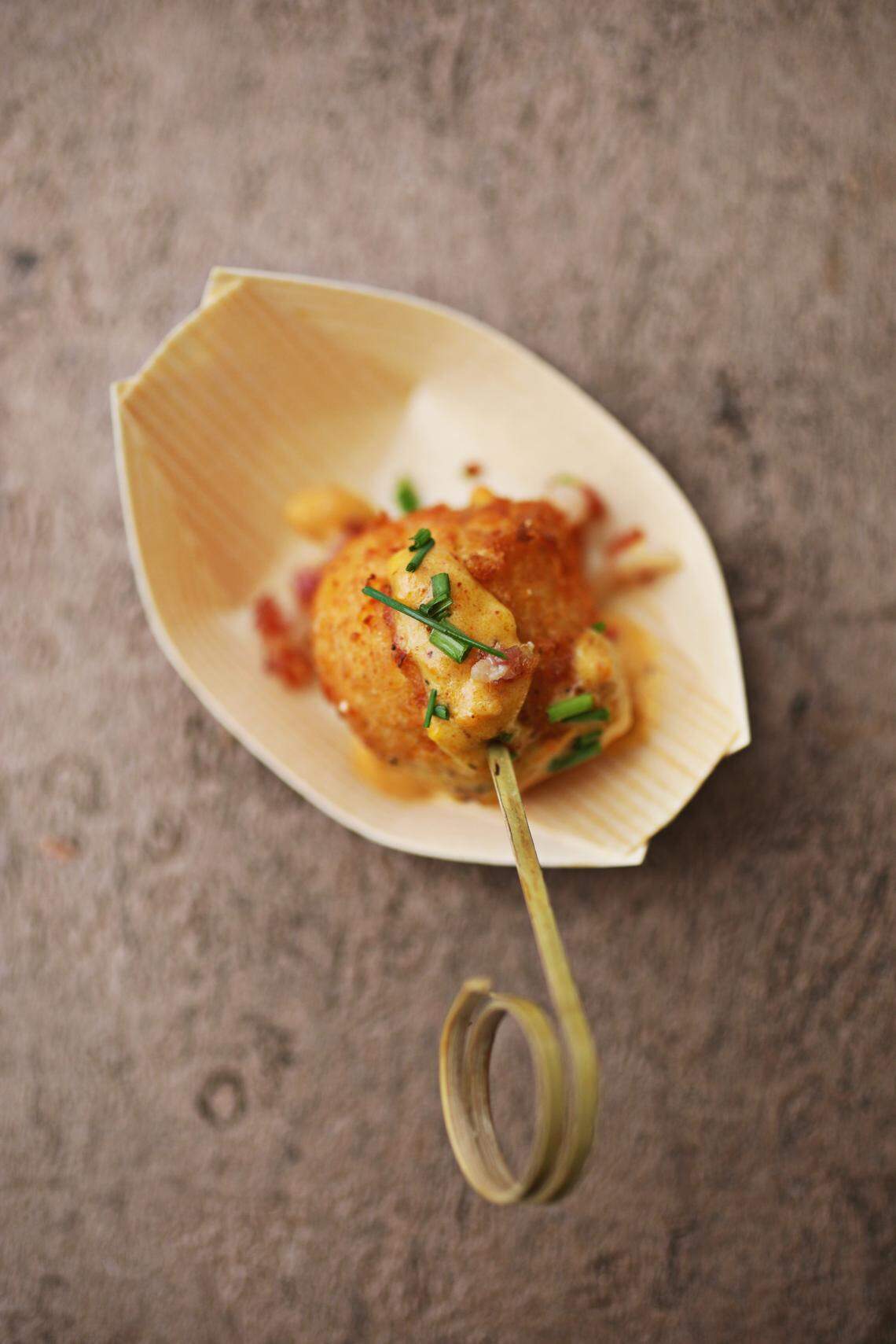 The Shrimp & Grits on a Stick from Ezzell’s Somethin’ Good is one of several new foods that will debut at The N.C. State Fair in Raleigh.