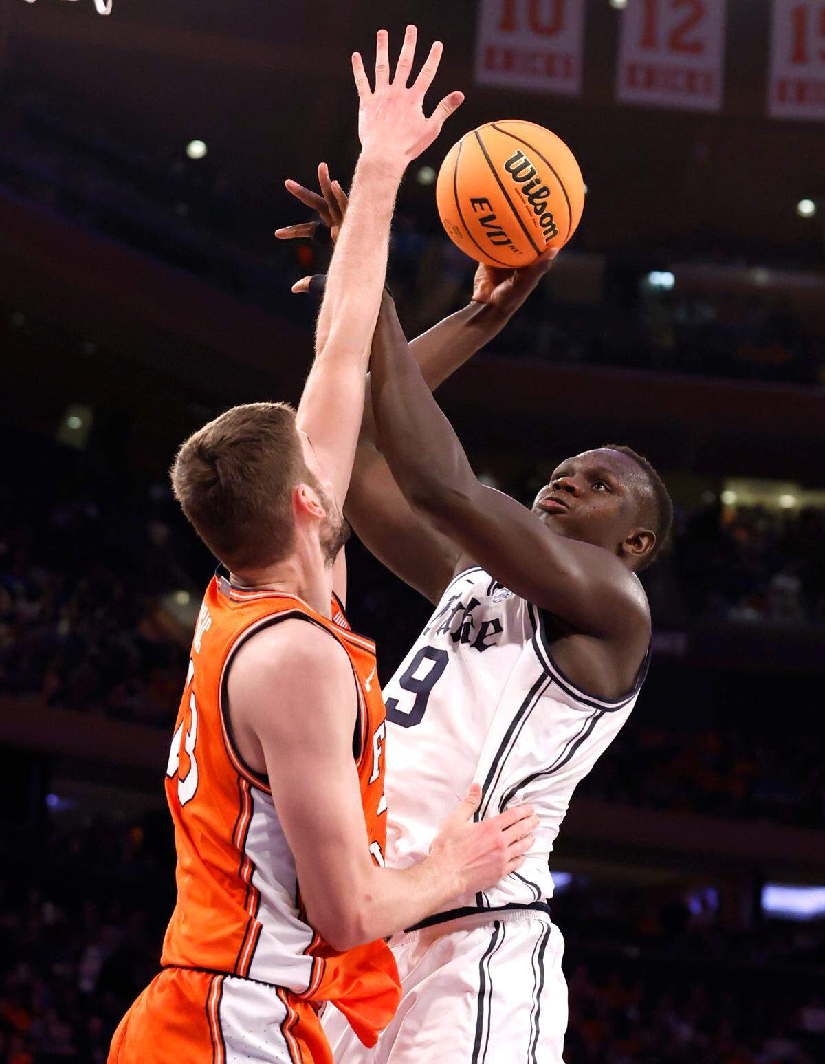 Duke’s Khaman Maluach (9) shoots as Illinois’ Tomislav Ivisic (13) defends during the second half of Duke’s 110-67 victory over Illinois in the SentinelOne Classic at Madison Square Garden in New York City Saturday, Feb. 22, 2025.