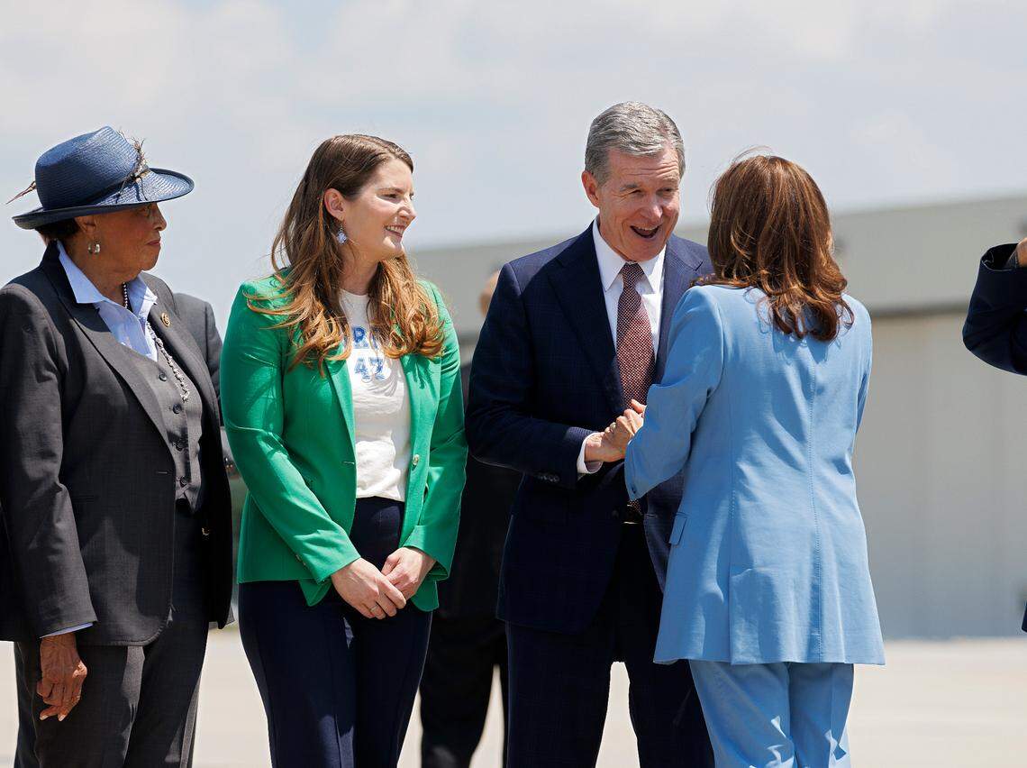 North Carolina Gov. Roy Cooper welcomes Vice President Kamala Harris after she arrived at RDU, Friday, August. 16, 2024.