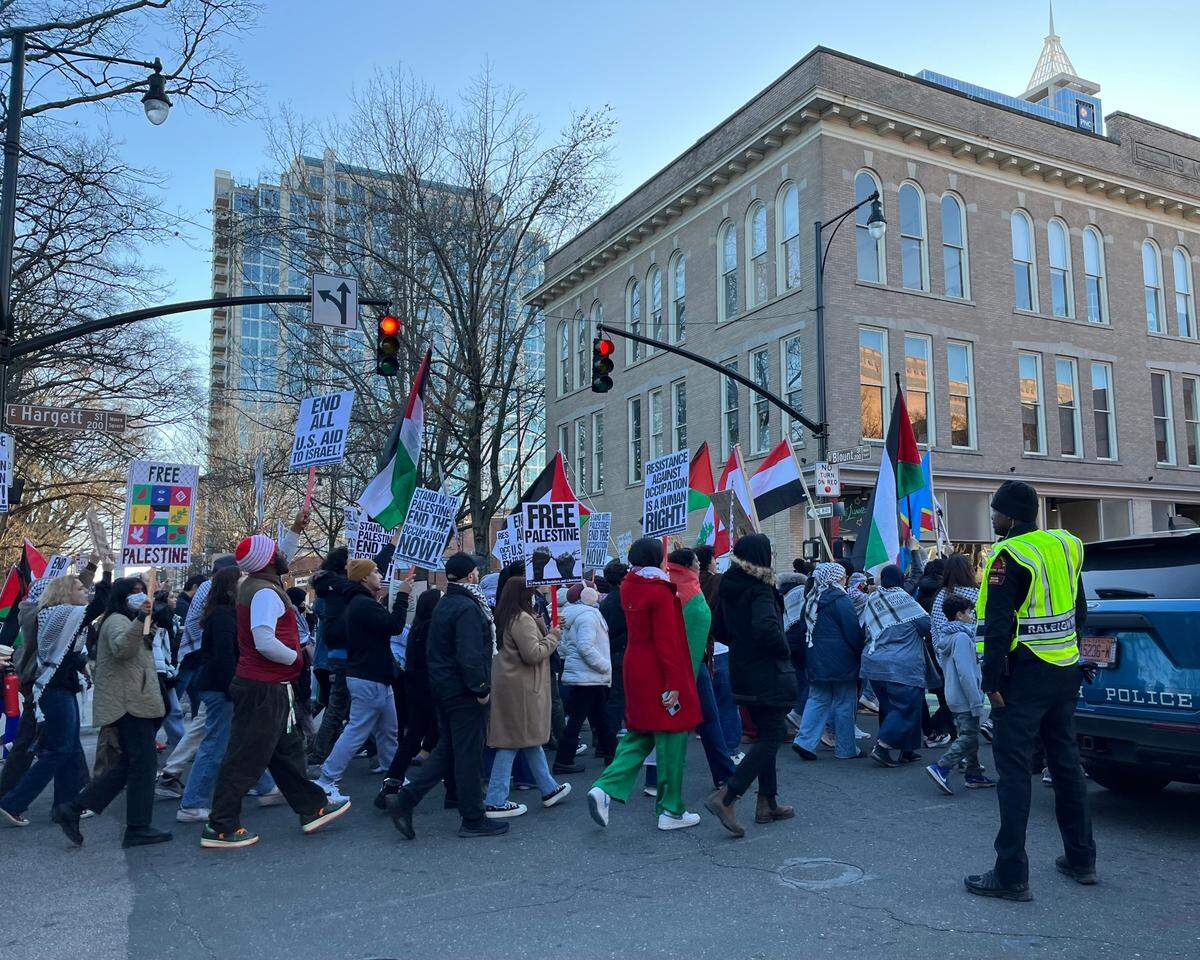 Protesters marched through downtown Raleigh on Sunday, January 21, 2024 demanding a cease-fire in the Israel-Hamas war.