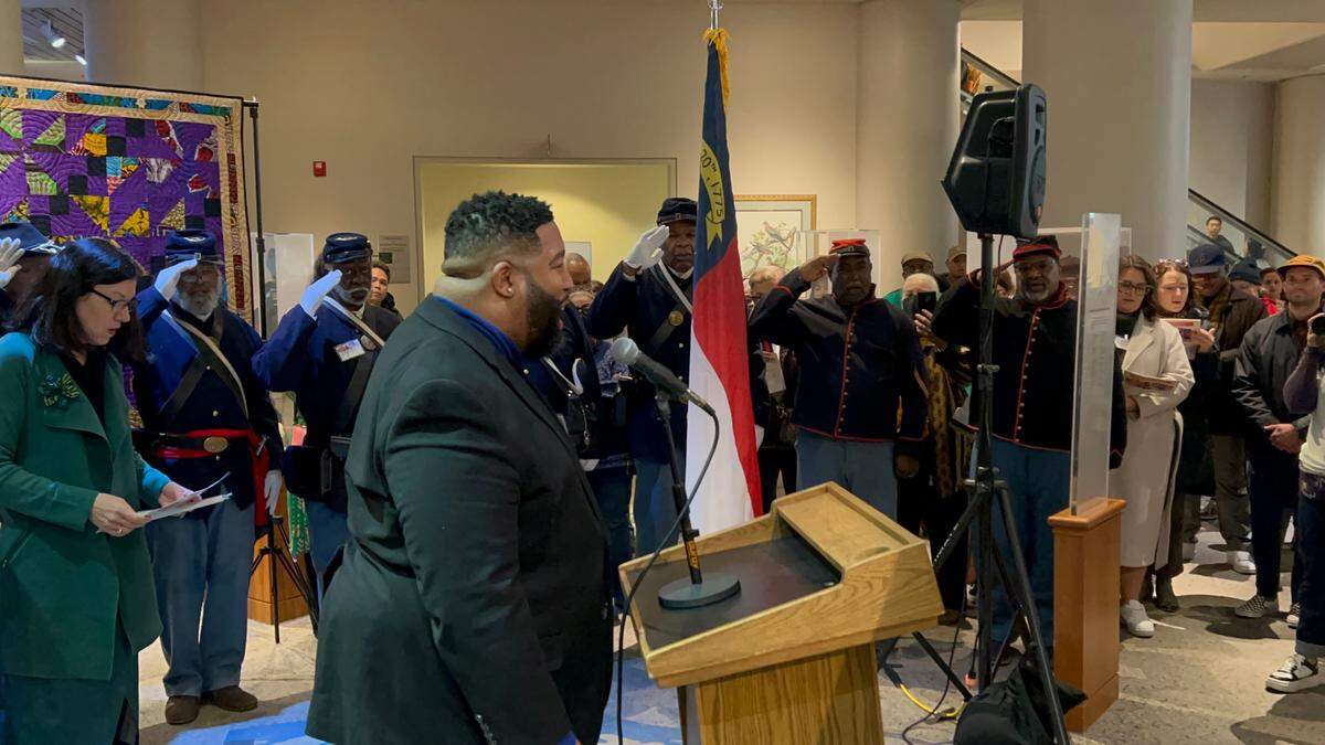 Members of the 35th United States Colored Troops interpretive unit stand at attention as Corey Leak sings “Lift Every Voice And Sing” at the 24th Annual African American Cultural Celebration held Jan. 25, 2025 at the N.C. Museum of Natural Sciences in Raleigh. N.C.