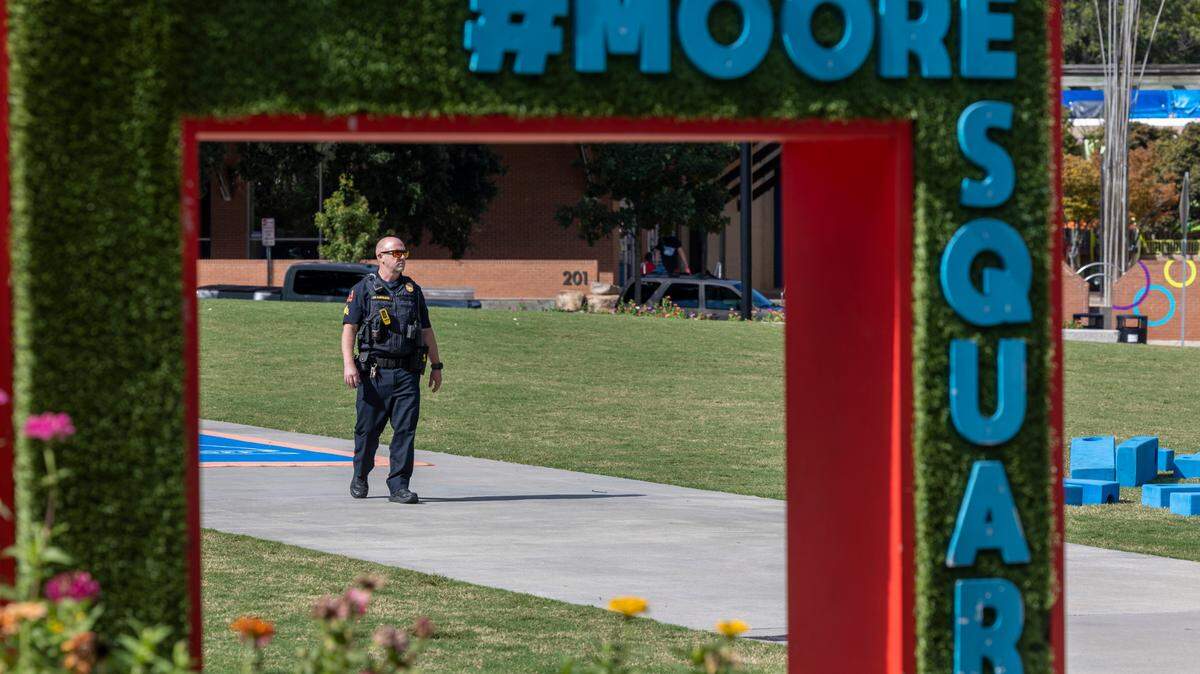 Raleigh Police Sergeant J.S. Harrelson walks through Moore Square as preparation was underway for final the ‘Jazz in the Square’ event on Thursday afternoon, September 28, 2023 in Raleigh, N.C. The City of Raleigh has stepped up the police presence in the park after seeing a spike in crime downtown.