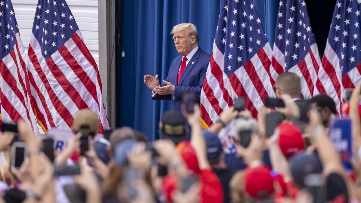 Former President Donald Trump takes the stage during a rally at the North Carolina Aviation Museum & Hall of Fame in Asheboro, NC on Wednesday, Aug. 21, 2024.