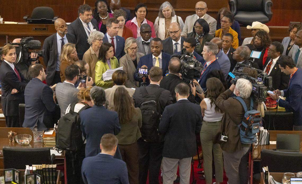 N.C. House Democratic Leader Rep. Robert Reives, flanked by House Democrats, talks with the media following passage of Senate Bill 249, a bill to realign the North Carolina Congressional districts, on Wednesday, October 22, 2025 at the General Assembly in Raleigh, N.C.