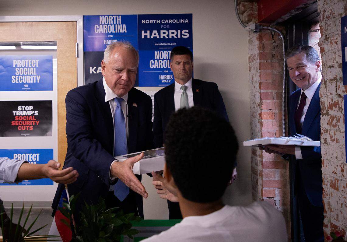 Democratic vice presidential candidate Tim Walz delivers cookies to the Harris-Walz campaign headquarters in Raleigh, N.C., Thursday, August 29, 2024.