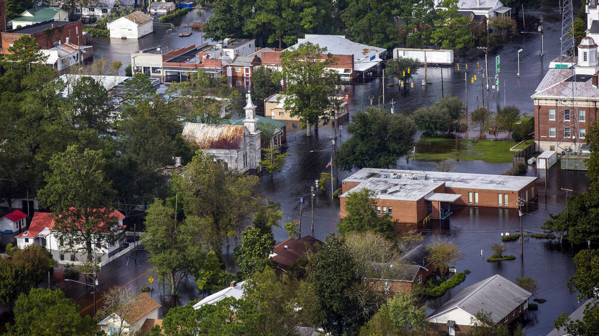 Three days after Hurricane Florence made landfall in Wilmington, NC, flood water still surrounds buildings in Trenton, NC, on Monday, Sept. 17, 2018.