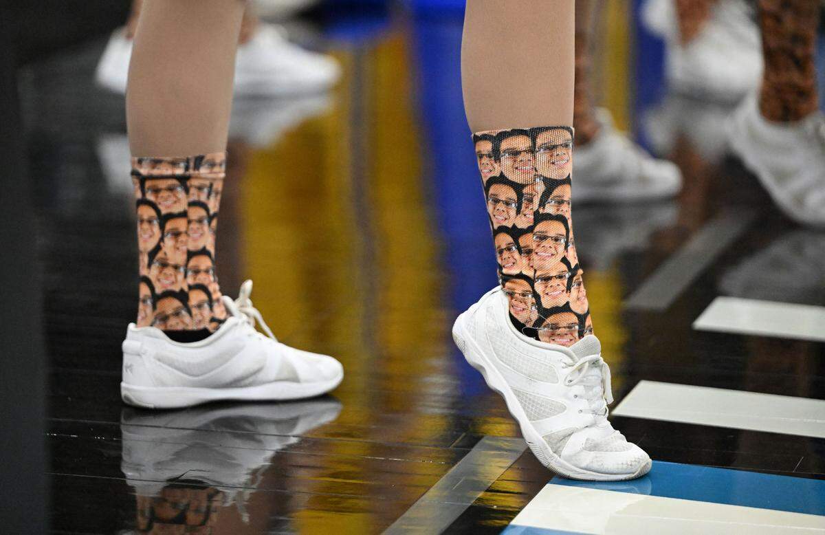 Mar 22, 2025; Providence, RI, USA; Socks with images of McNeese State Cowboys manager Amir Khan (not pictured) before a second round men’s NCAA Tournament game against the Purdue Boilermakers at Amica Mutual Pavilion. Mandatory Credit: Brian Fluharty-Imagn Images