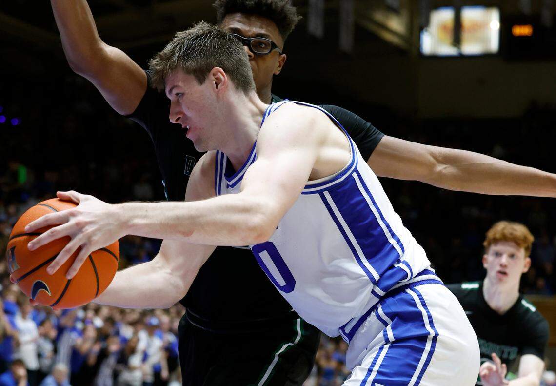 Duke’s Kyle Filipowski (30) drives past Dartmouth’s Brandon Mitchell-Day (21) during the second half of Duke’s 92-54 victory over Dartmouth at Cameron Indoor Stadium in Durham, N.C., Monday, Nov. 6, 2023.