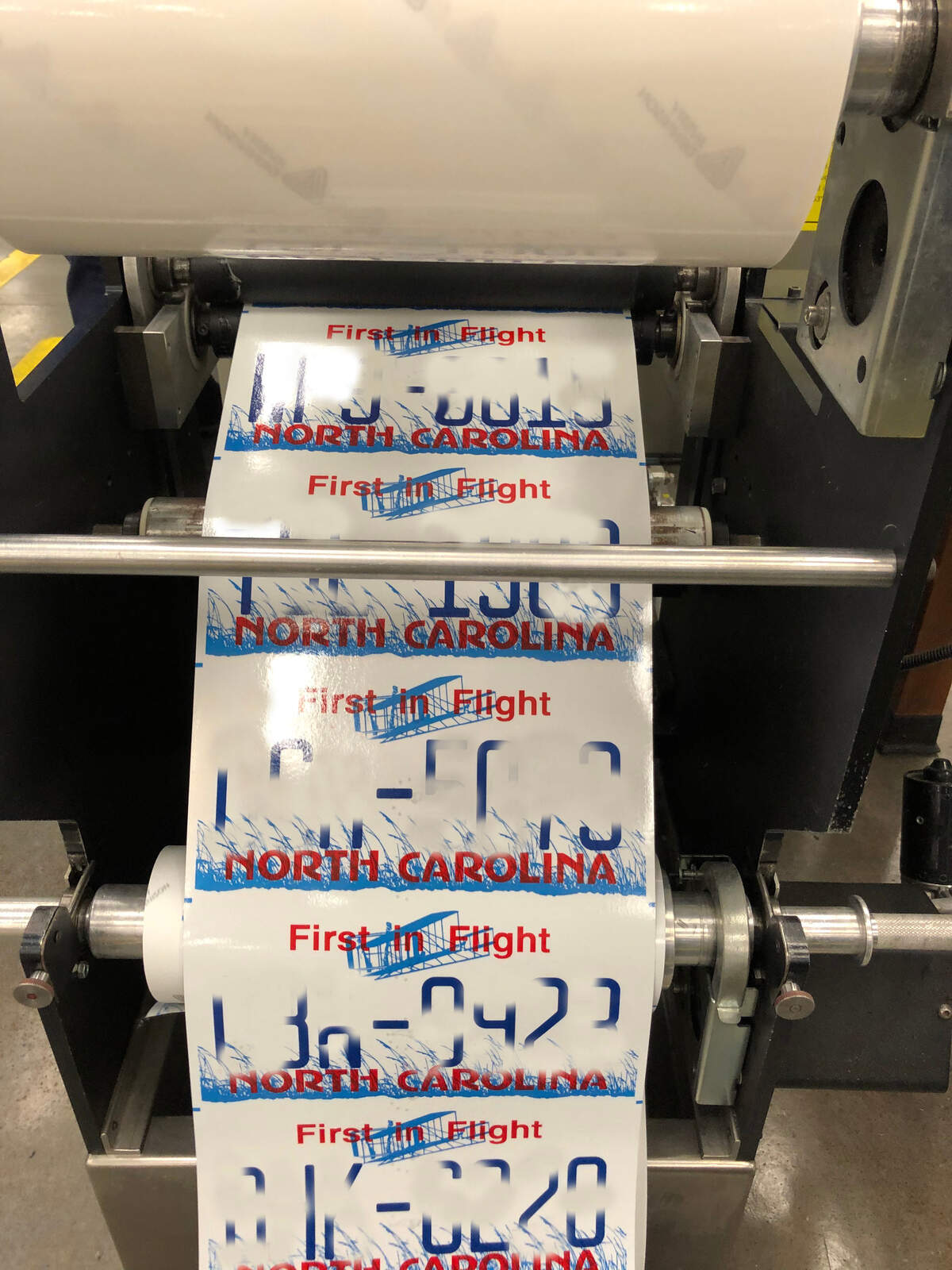 New North Carolina license plates being manufactured at the N.C. Correctional&nbsp;Institute for&nbsp;Women&nbsp;in Raleigh. The numbers in the photo have been blurred.