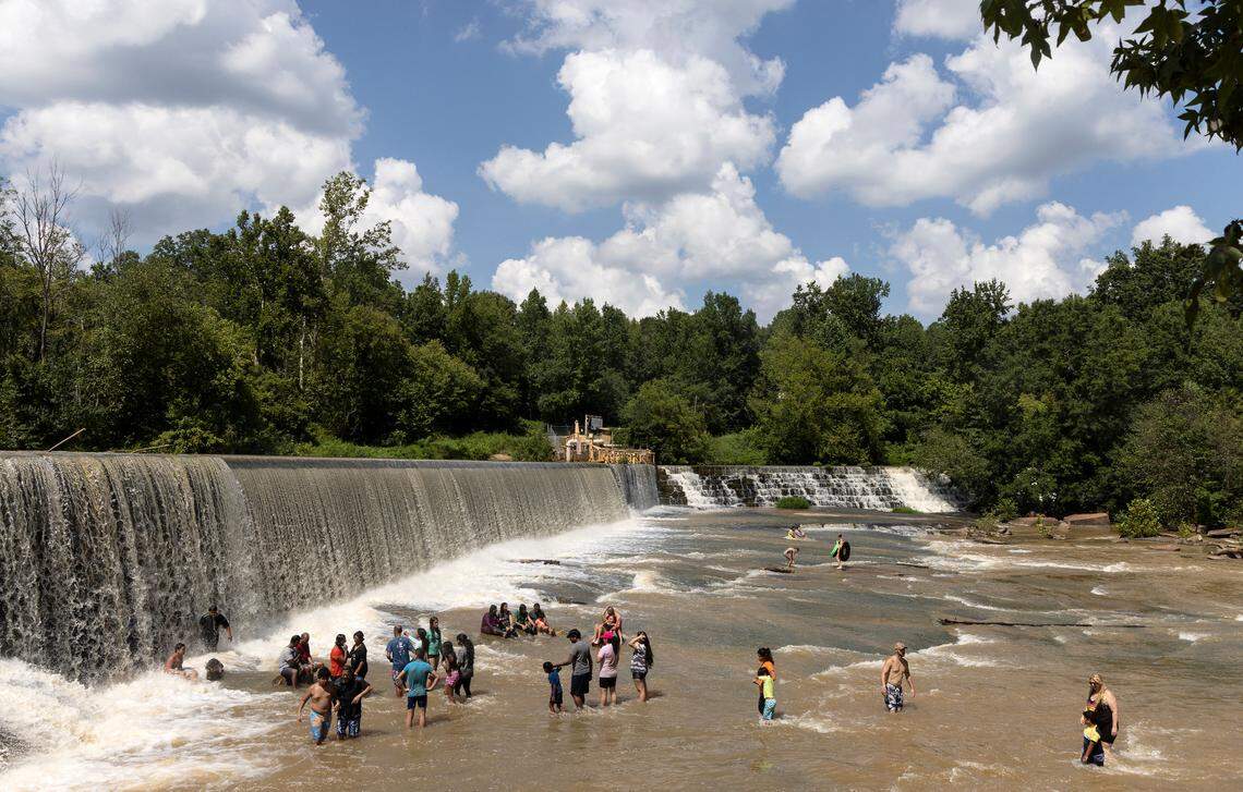 Crowds enjoy RiverPark at Cooleemee Falls on Saturday, Aug. 5, 2023, in Woodleaf, N.C.