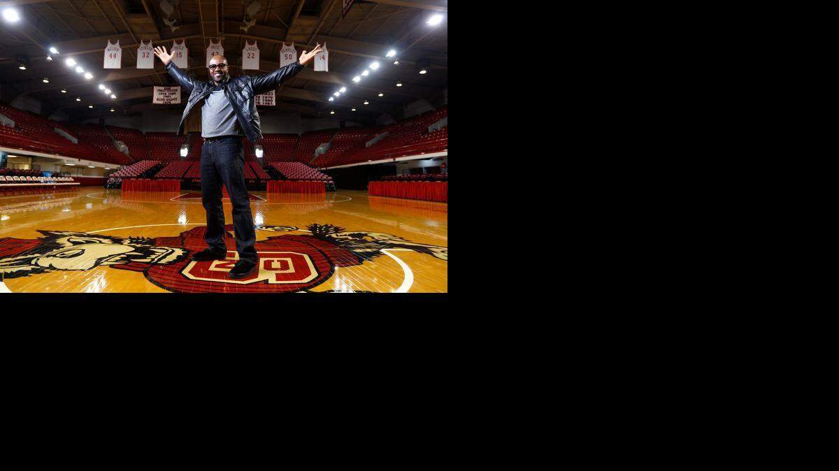 Torry Holt poses in Reynolds Coliseum on Friday, Dec. 19, 2014. In the spring, the Holt Brothers Construction company will help remodel Reynolds Coliseum. “For us to have a part in that, at our university … the feeling that we have for that is indescribable,” Holt said.
