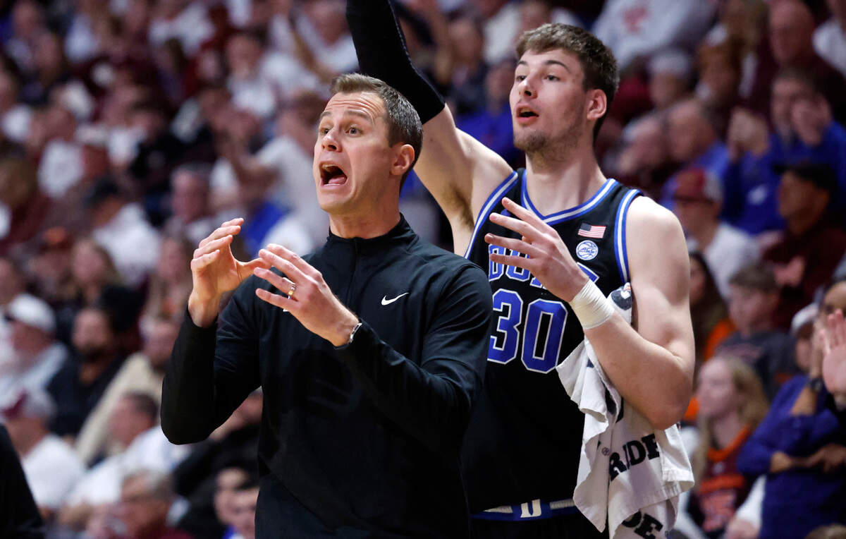 Duke head coach Jon Scheyer yells to the team during the second half of Duke’s 77-67 victory over Virginia Tech at Cassell Coliseum in Blacksburg, Va., Monday, Jan. 29, 2024.