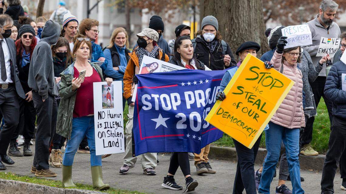 Hundreds of demonstrators march around the perimeter of the North Carolina State Capitol in Raleigh on Wednesday, Feb. 5, 2024, to protest the Trump administration. The protest was one of 50 planned in state capitals nationwide on Wednesday.