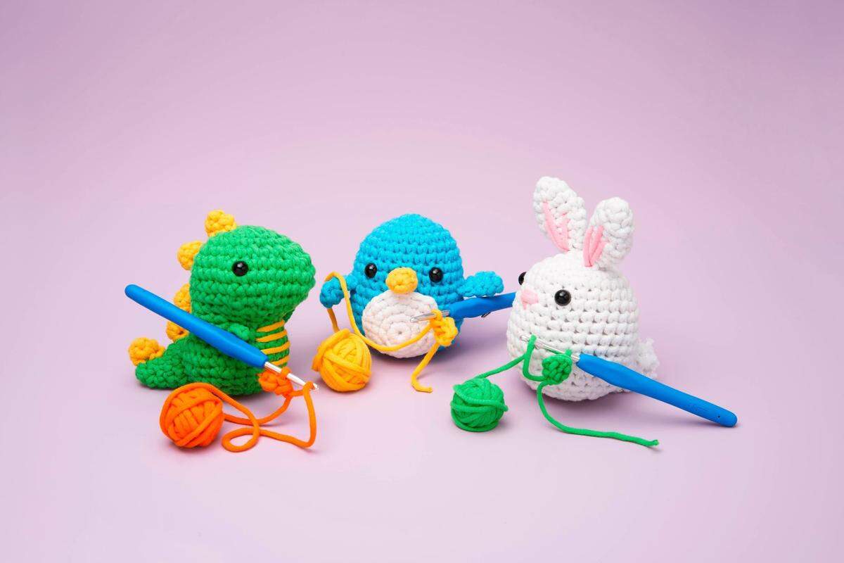Three of the amigurumi creatures from The Woobles, a North Carolina-based crochet company. Pierre the Penguin (middle) has been a best-seller.