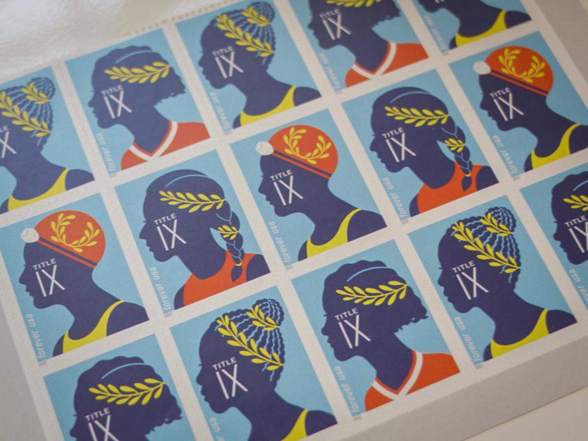March 24, 2022; Easton, MD, USA; A page of Title IX commemorative stamps belonging to Kitty Bayh, widow of former Indiana senator Birch Bayh, is seen in her home in Easton, Md. on March 24, 2022. Birch Bayh, the former United States Senator from Indiana was the author of Title IX. Mandatory Credit: Jasper Colt-USA TODAY