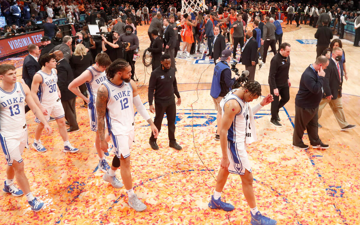 Duke head coach Mike Krzyzewski and the team walk off the court after Virginia Tech’s 82-67 victory over Duke in the finals of the ACC men’s basketball tournament at the Barclays Center in Brooklyn, N.Y., Saturday, March 12, 2022.