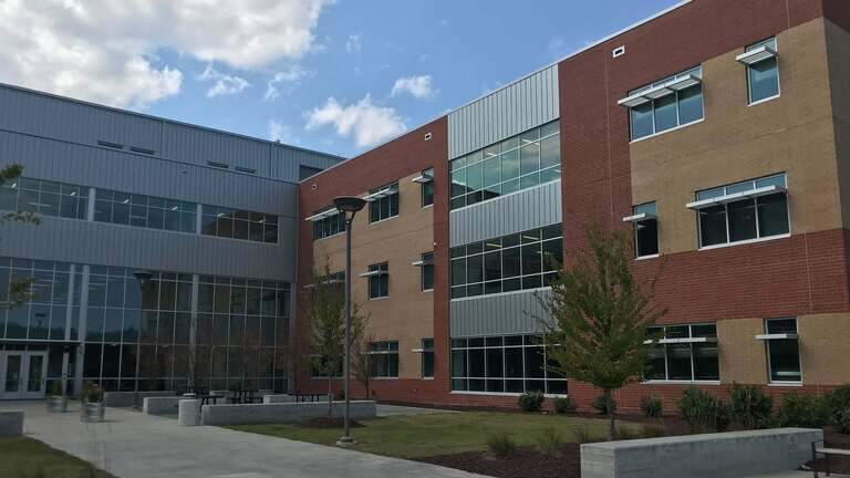 Student charged with bringing a gun, 2 knives to Willow Spring High School