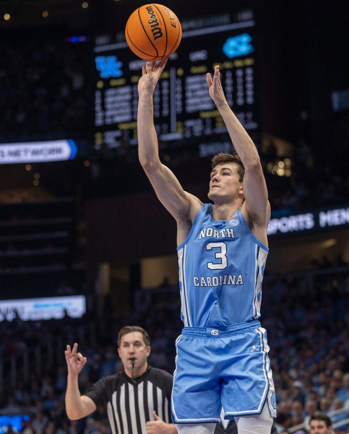 North Carolina’s Cormac Ryan (3) sinks a three point basket in the first half against Kentucky on Saturday, December 16, 2023 at State Farm Arena in Atlanta, Georgia. Ryan had 12 points in the first half.