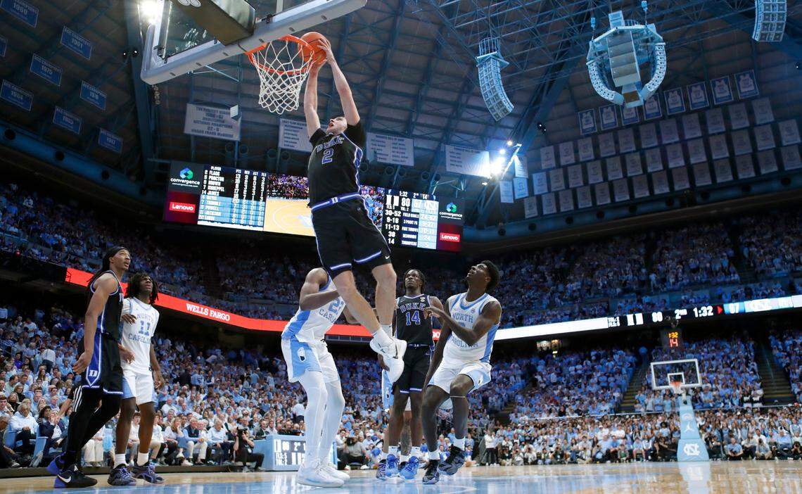 Duke’s Cooper Flagg (2) heads to slam in two late in the second half of Duke’s 82-69 victory over UNC at the Smith Center in Chapel Hill, N.C., Saturday, March 8, 2025.
