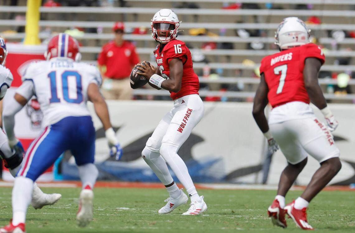 N.C. State quarterback CJ Bailey (16) looks for receivers downfield during the first half of N.C. State’s game against LA Tech at Carter-Finley Stadium in Raleigh, N.C., Saturday, Sept. 14, 2024.