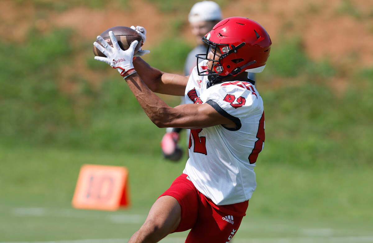 N.C. State’s Terrell Timmons, Jr. (82) pulls in a reception during the Wolfpack’s first practice of fall camp in Raleigh, N.C., Wednesday, August 3, 2022.