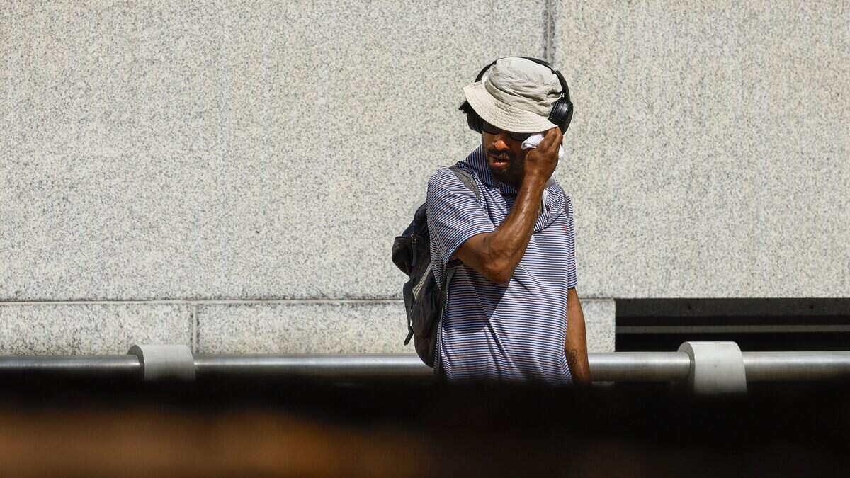 Pedestrians faced muggy weather and high temperatures in downtown Raleigh before brief afternoon showers on Monday, June 29, 2026.