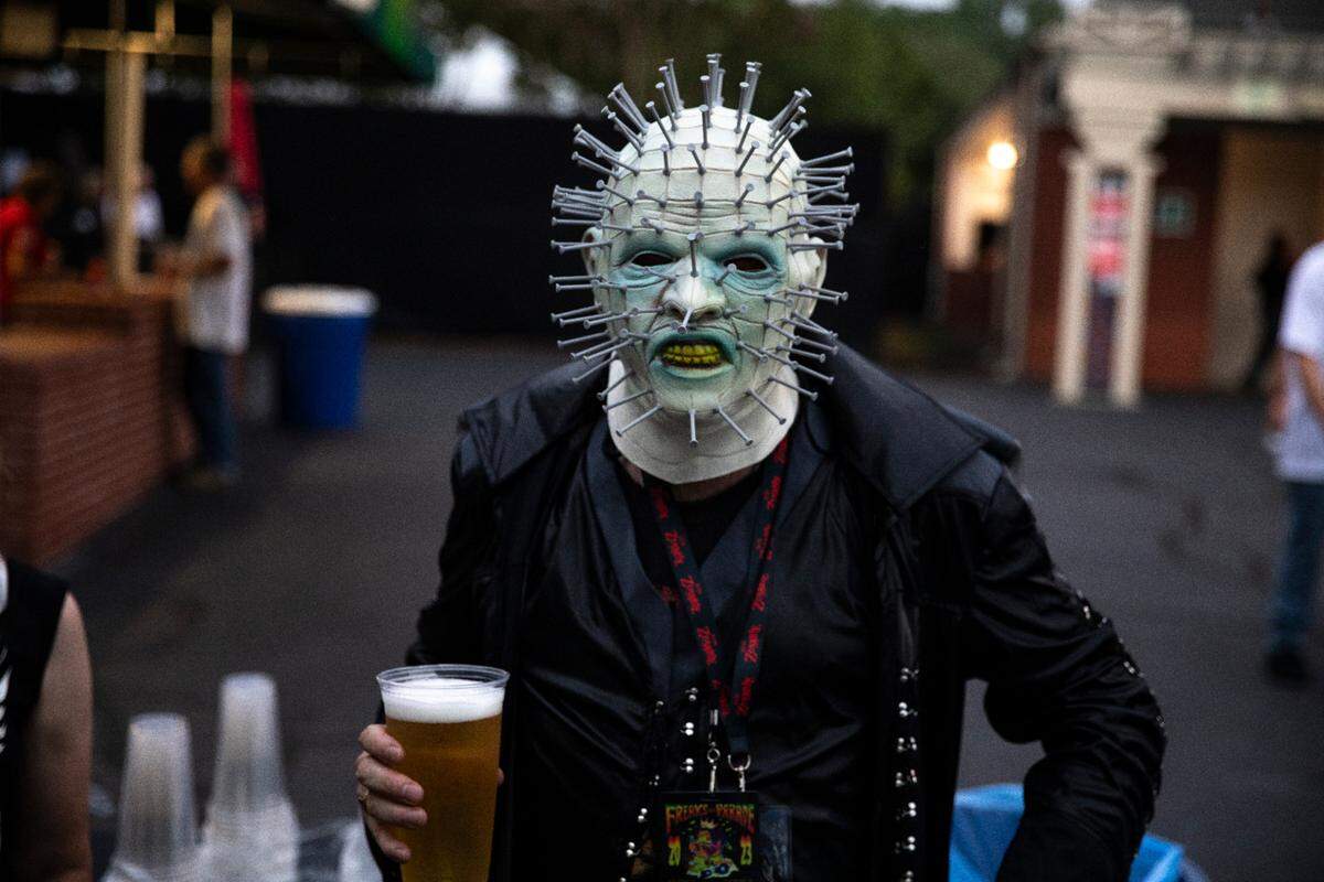 A dedicated fan grabs a beer between sets of Rob Zombie and Alice Cooper’s “Freaks On Parade Tour” at Coastal Carolina Music Park at Walnut Creek, Wednesday night, Aug. 30, 2023.