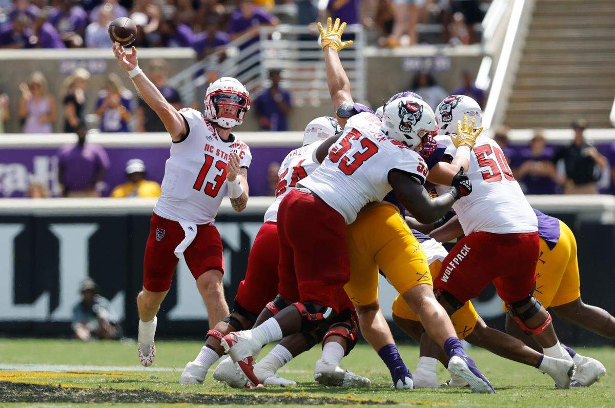 N.C. State quarterback Devin Leary (13) passes during the first half of N.C. States game against ECU at Dowdy-Ficklen Stadium in Greenville, N.C., Saturday, Sept. 3, 2022.