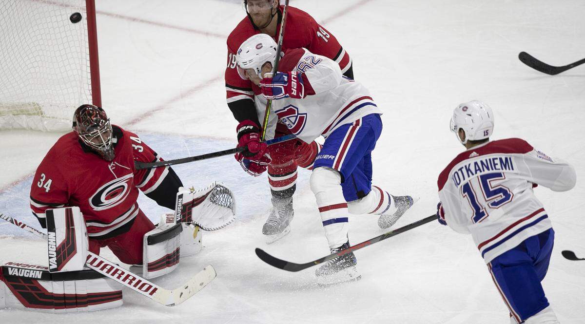 Montreal’s Jesperi Kotkaniemi (15) scores on Carolina Hurricanes goalie Petr Mrazek (34) in the second period to tie the Hurricanes 2-2 on Thursday, October 3, 2019 at the PNC Arena in Raleigh, N.C.