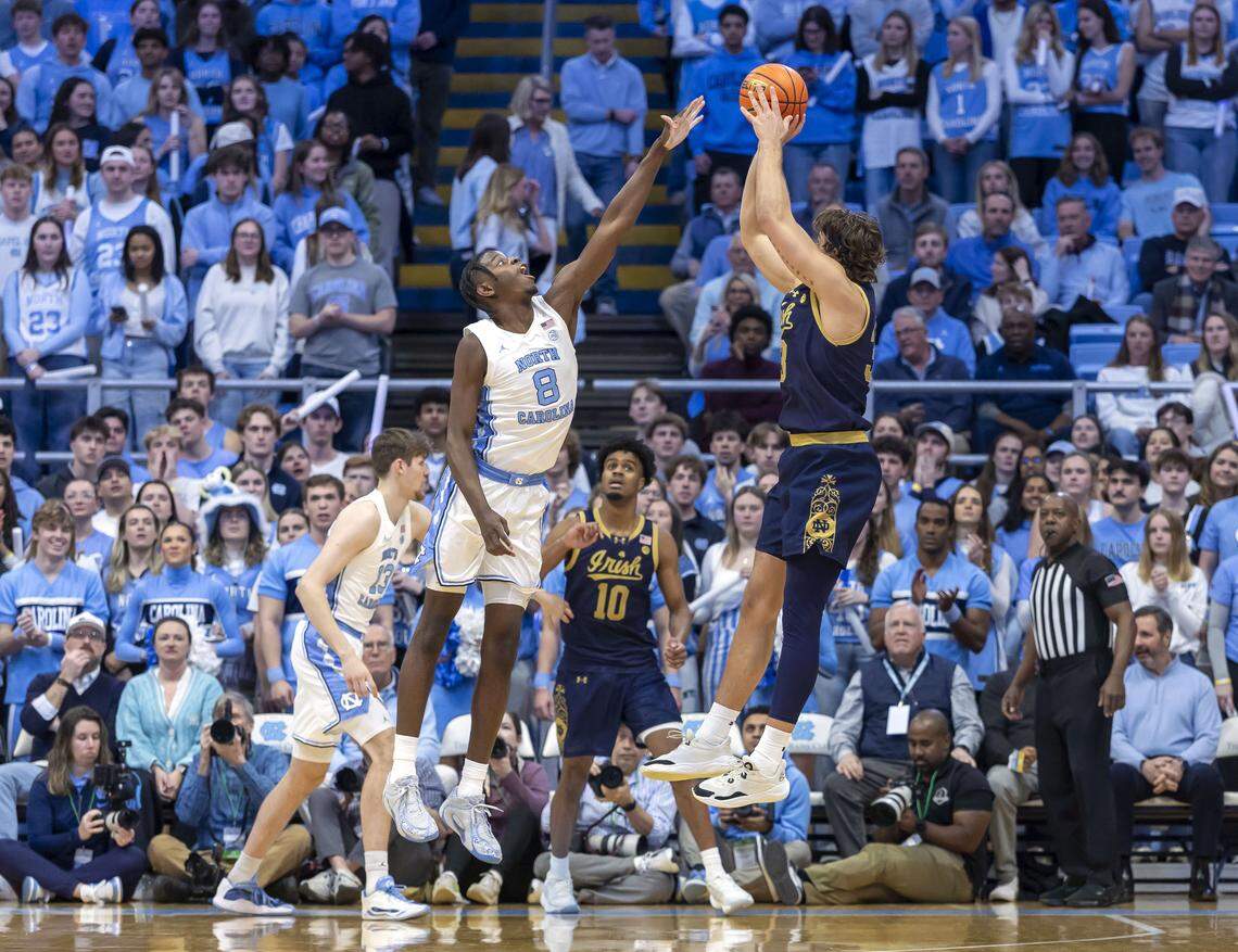 North Carolina forward Caleb Wilson (8) defends Notre Dame forward Carson Towt (33) in the first half on Wednesday, January 21, 2026 at the Smith Center in Chapel Hill, N.C. 
