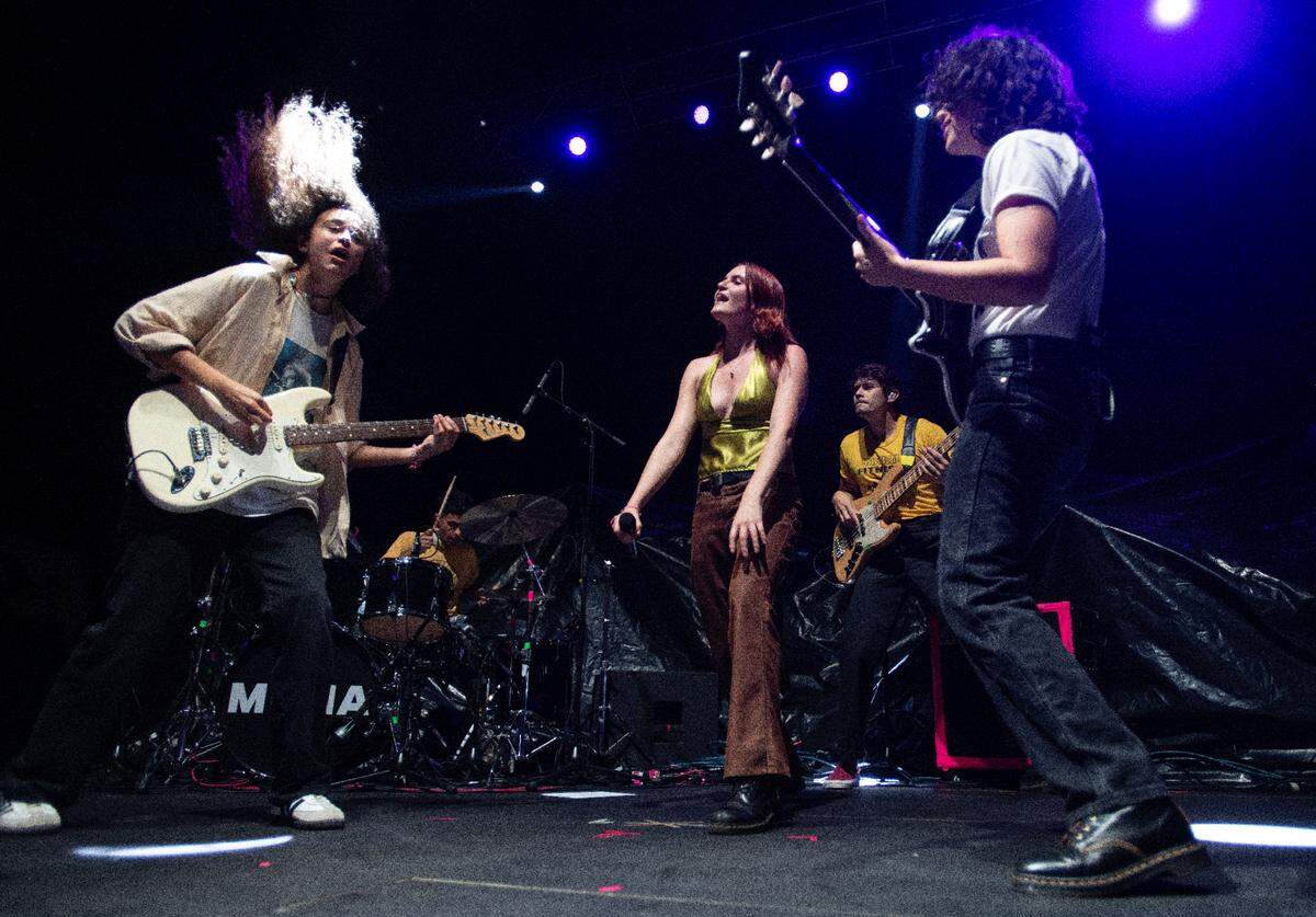 MUNA opens for Phoebe Bridgers in concert at Raleigh, N.C.’s Red Hat Amphitheater Tuesday night, Sept. 21, 2021.