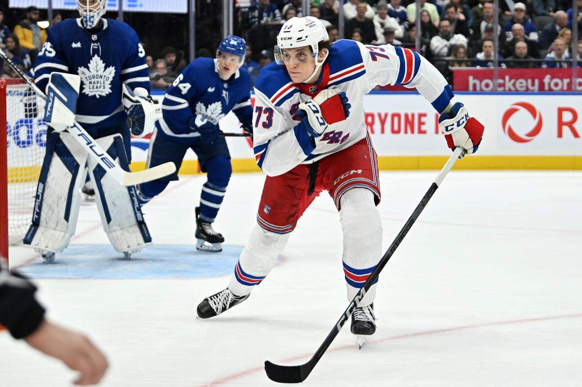 New York Rangers forward Matt Rempe (73) pursues the play against the Toronto Maple Leafs in the third period at Scotiabank Arena.