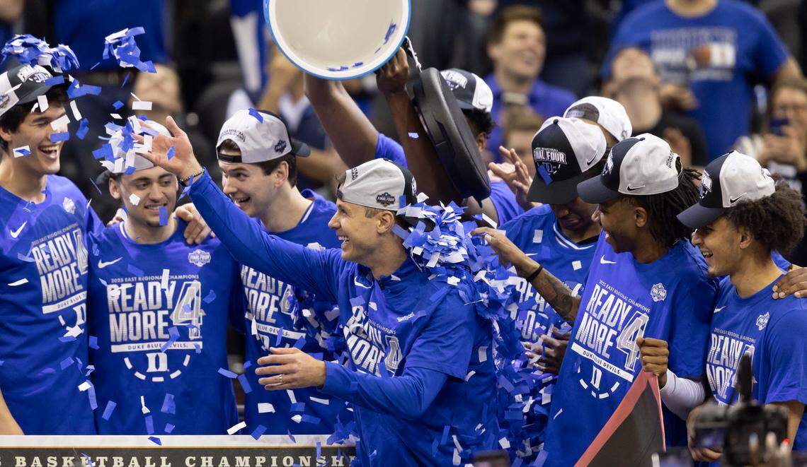 Duke coach Jon Scheyer celebrates with his team after their 85-65 victory over Alabama on Saturday, March 29, 2025 during the NCAA East Regional final at Prudential Center in Newark, N.J.