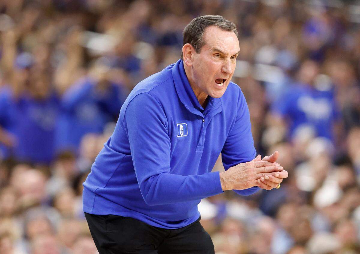 Duke head coach Mike Krzyzewski encourages his team during the first half of Dukes game against UNC in the Final Four at Caesars Superdome in New Orleans, La., Saturday, April 2, 2022.