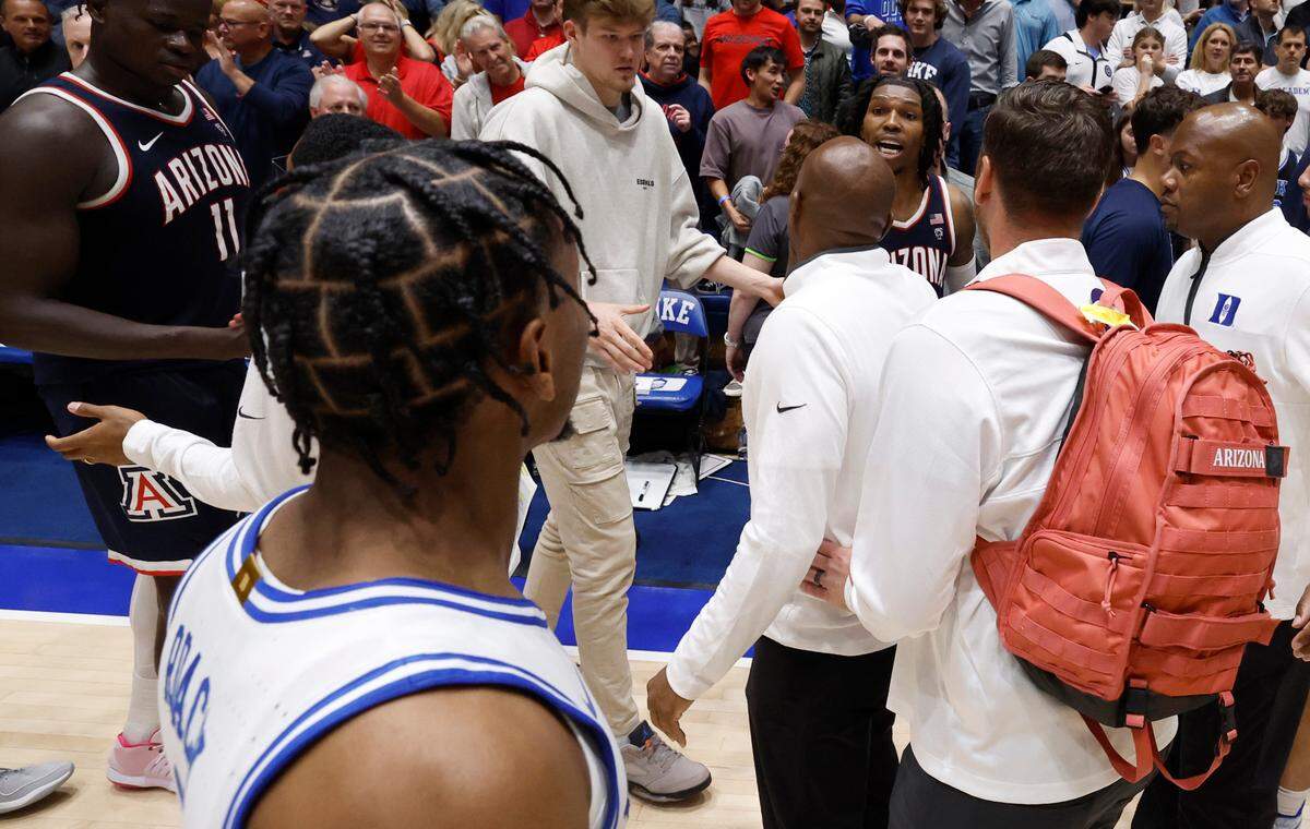 Arizona’s Caleb Love (2) has words with Duke’s Jeremy Roach (3) after Arizona’s 78-73 victory over Duke at Cameron Indoor Stadium in Durham, N.C., Friday, Nov. 10, 2023.