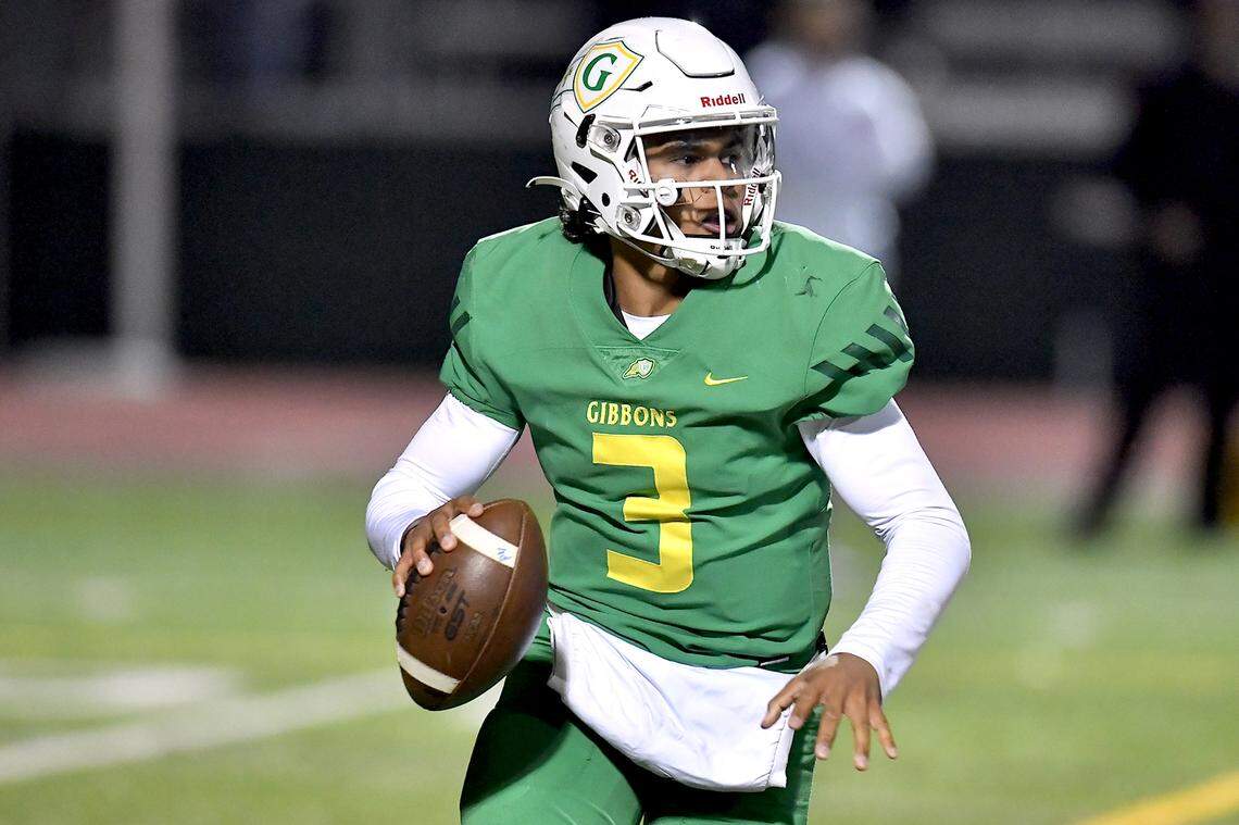 Cardinal Gibbons quarterback Gannon Jones (3) looks to pass downfield during the second half against Rolesville. The Rolesville Rams and the Cardinal Gibbons Crusaders met in the East Regional Final of the NCHSAA 4A football playoffs in Raleigh, N.C. on December 13, 2024.