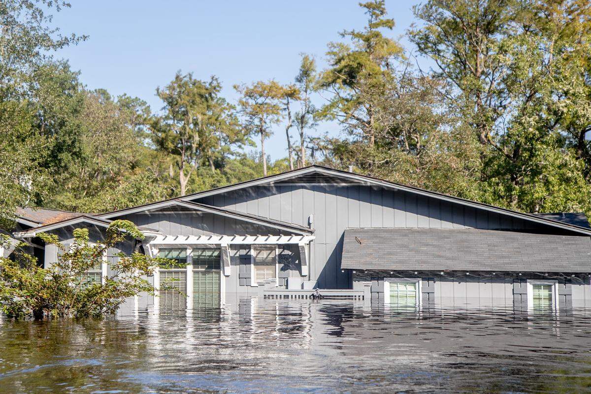 The Little Pee Dee River slowly rises over a home in the Fork Retch community Wednesday Sept. 19, 2018, in Nichols, SC. Fork Retch road has flooded twice in the last two years.