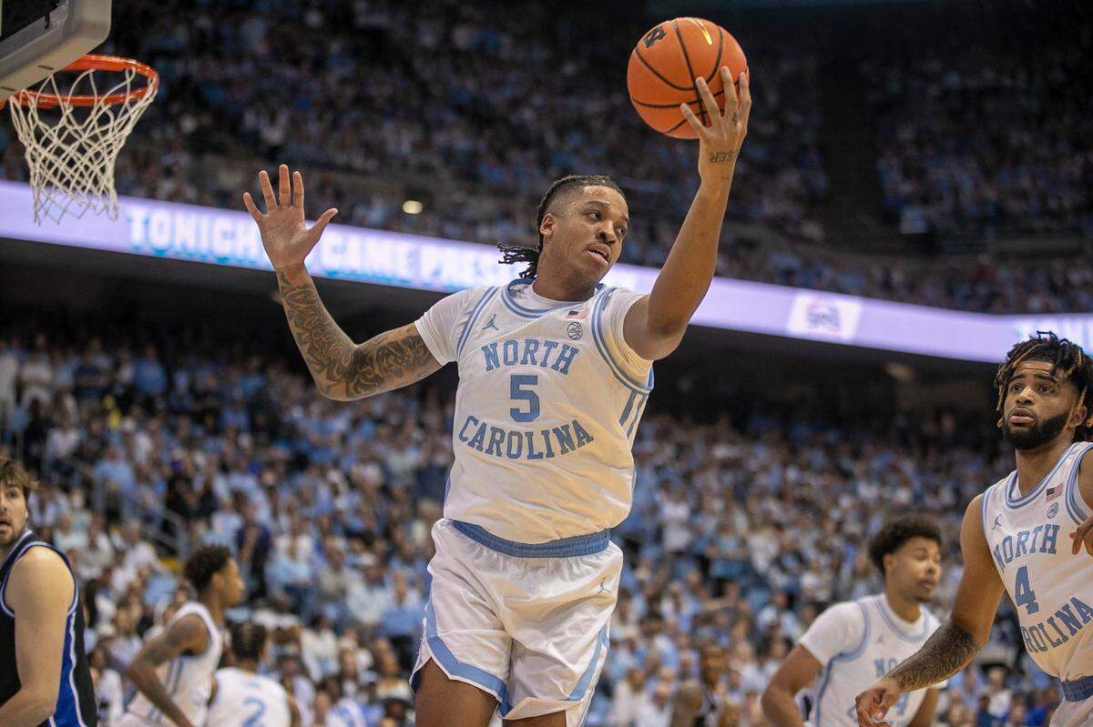 North Carolina’s Armando Bacot (5) collects a defensive rebound in the first half against Duke on Saturday, March 4, 2023 at the Smith Center in Chapel Hill, N.C.
