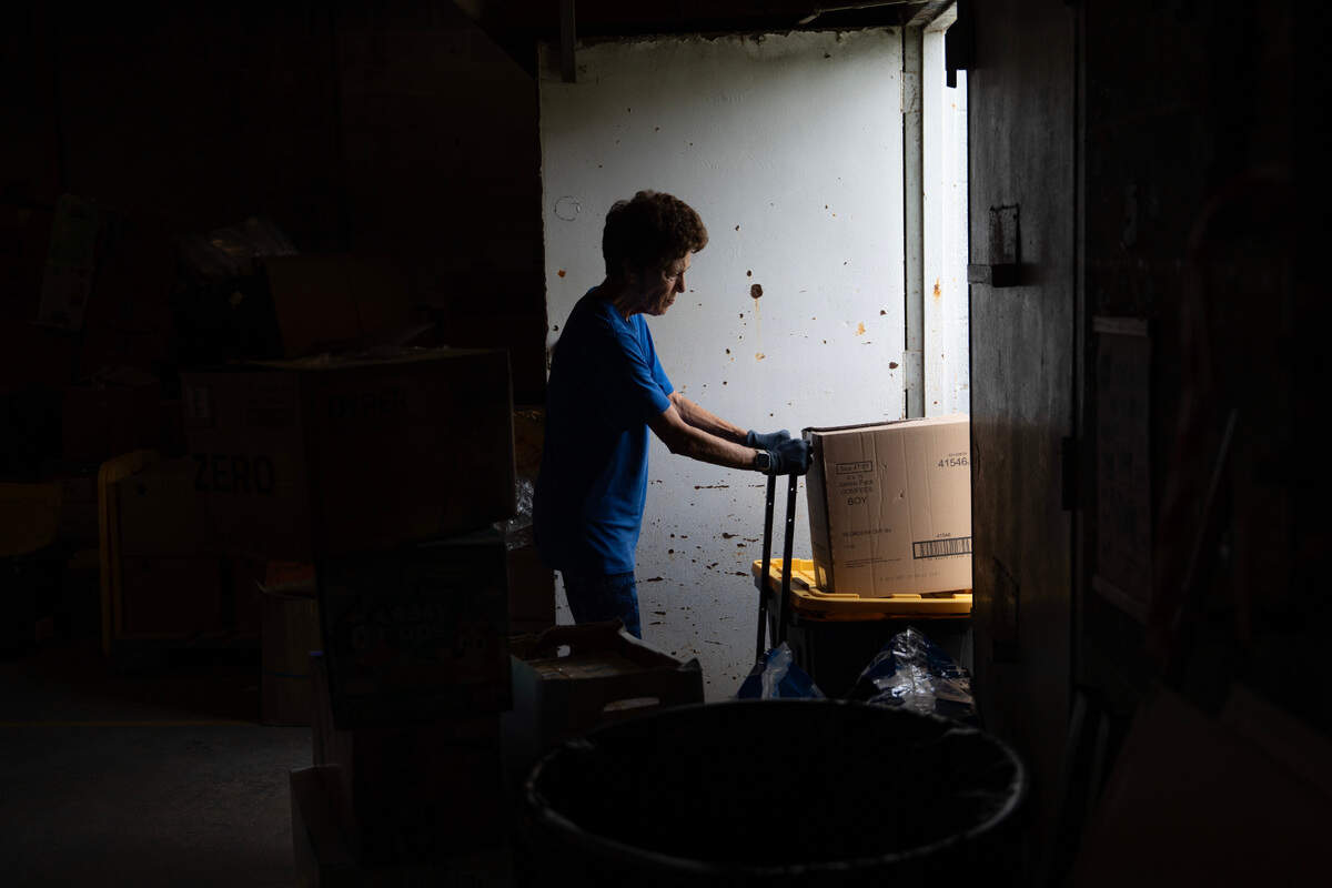 Volunteers from Day One Relief gather supplies to distribute in Durham, N.C. on Thursday, July 10, 2025.