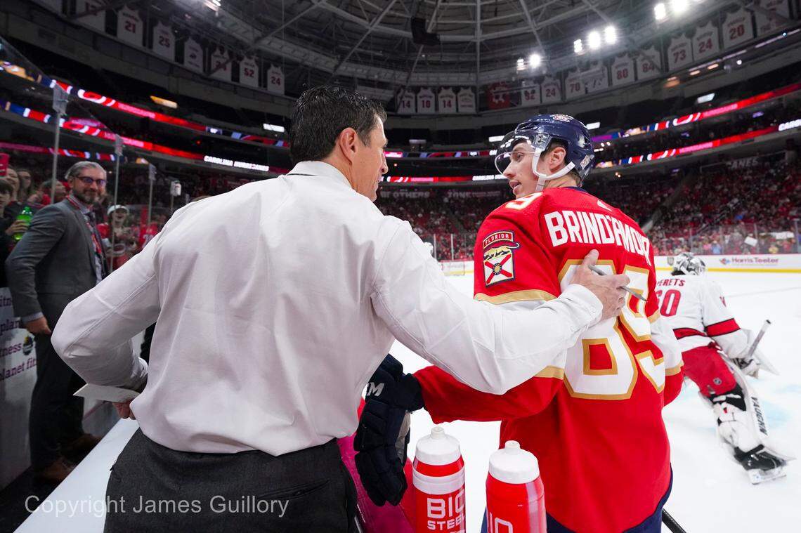 Sep 27, 2023; Raleigh, North Carolina, USA; Carolina Hurricanes head coach Rod Brind’Amour talks to his son Florida Panthers forward Skyler Brind’Amour (89) before the game at PNC Arena. Mandatory Credit: James Guillory-USA TODAY Sports