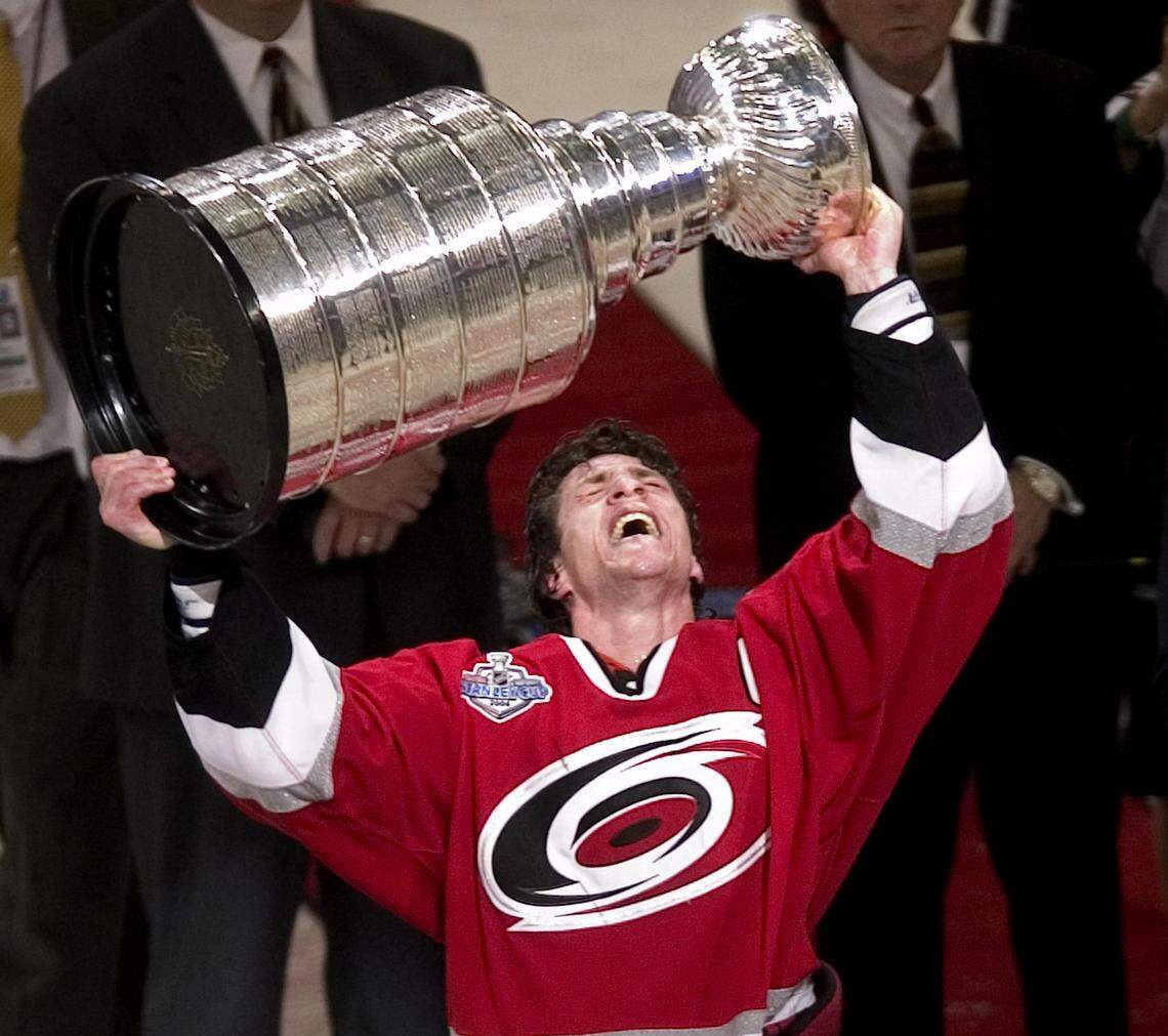 Carolina Hurricanes Captain Rod Brind'Amour hoists the Stanley Cup after the Canes defeated Edmonton 3-1 on June 19, 2006, in game seven of the Stanley Cup finals at the RBC Center, now known as the Lenovo Center.
