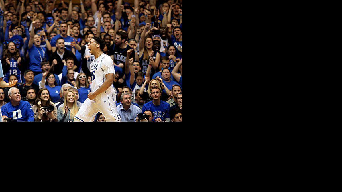 Jahlil Okafor gives Duke a 62-61 lead in the second half against UNC at Cameron Indoor Stadium in Durham.
