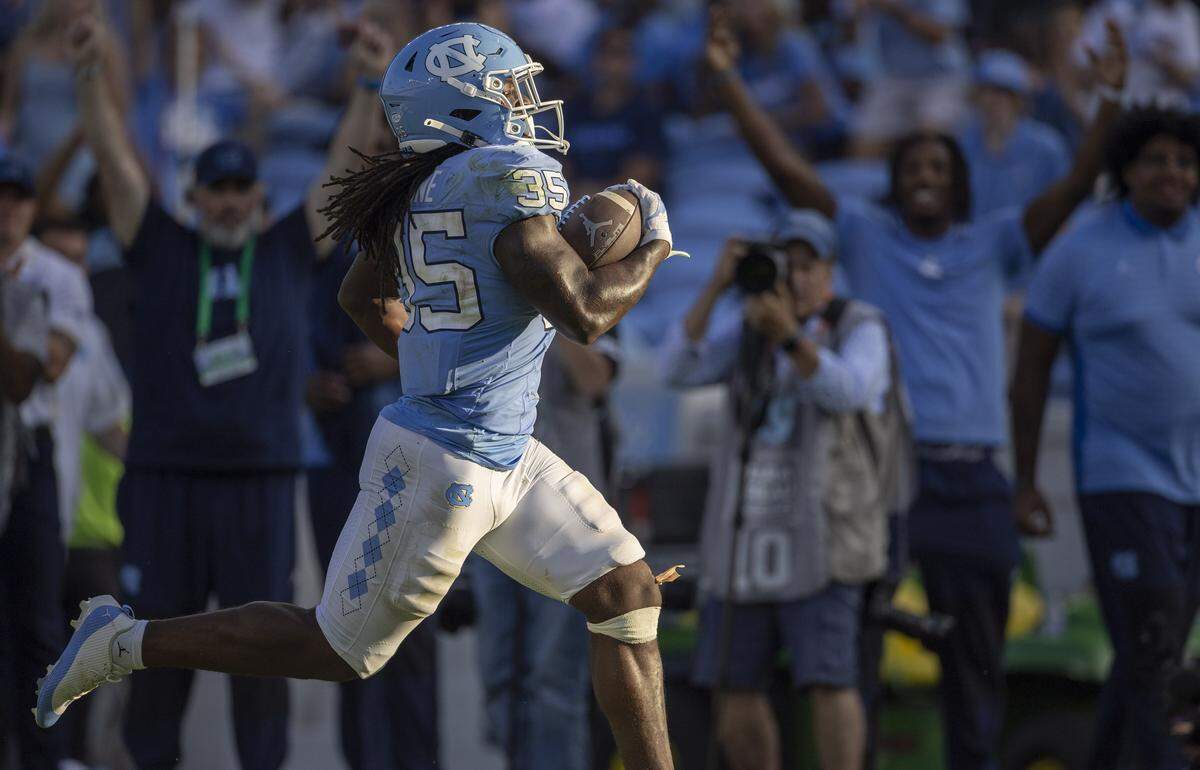 North Carolina running back Demon June (35) breaks away on a 45-yard touchdown run in the fourth quarter to give the Tar Heels a 41-3 lead on Saturday, September 13, 2025 at Kenan Stadium in Chapel Hill, N.C.