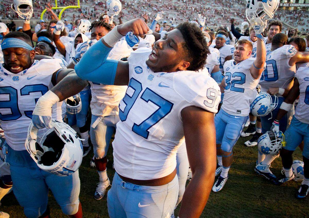 North Carolinas Jalen Dalton (97) leads the team as they celebrate their 37-35 victory over Florida State on Saturday October 1, 2016, at Doak Campbell Stadium in Tallahassee, Florida.